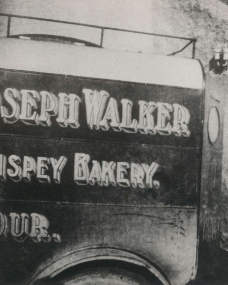 Close up of a vintage photo of Walkers shortbread van in black and white 