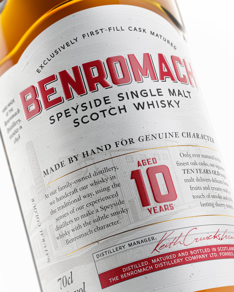 Close up of Benromach bottle on white background