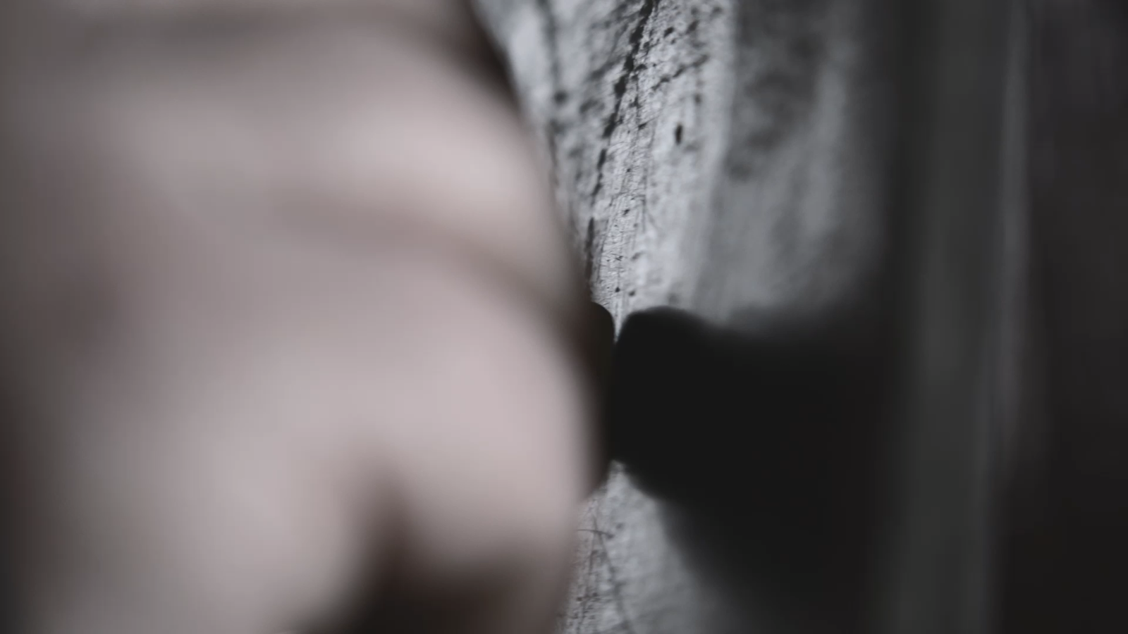 Close up of someone hand writing on a page