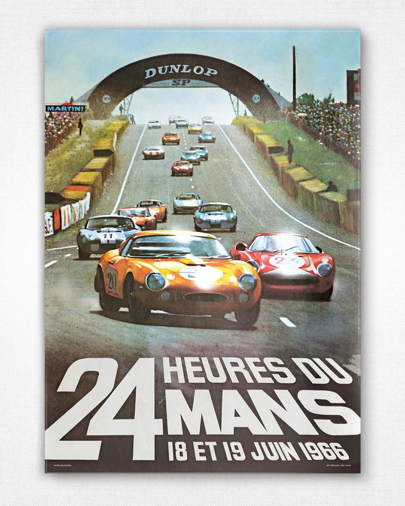 A vintage looking magazine front of race cars 